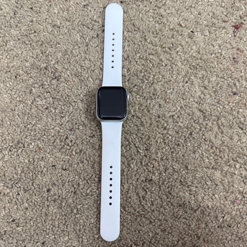 Apple Smartwatch with White Band and Black Face